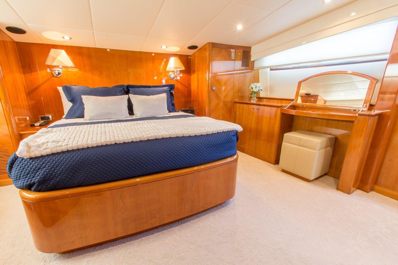 a bed in a room aboard NO NAME AZIMUT 100 JUMBO Yacht for Sale