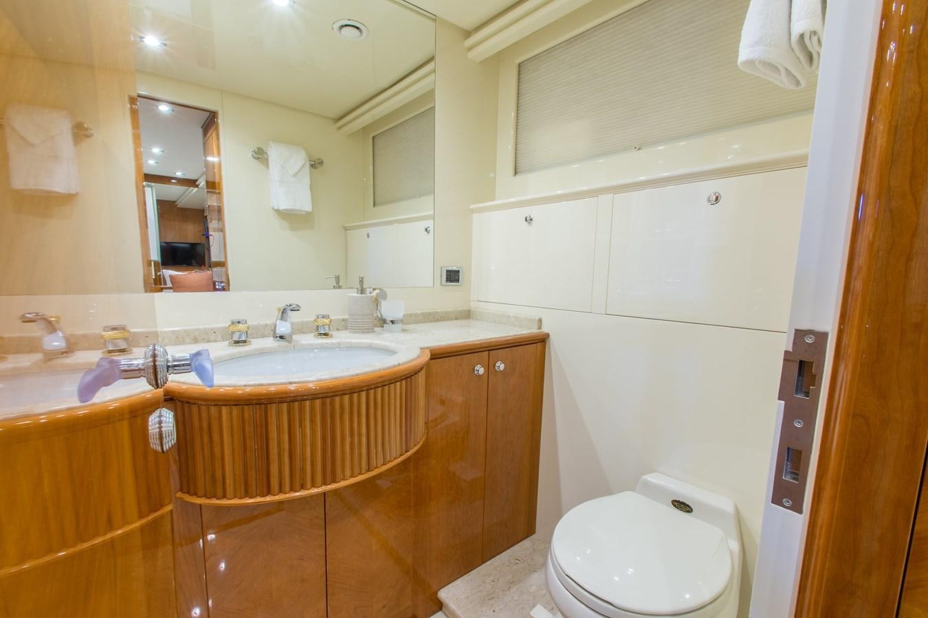 a bathroom with a sink and a toilet aboard NO NAME AZIMUT 100 JUMBO Yacht for Sale