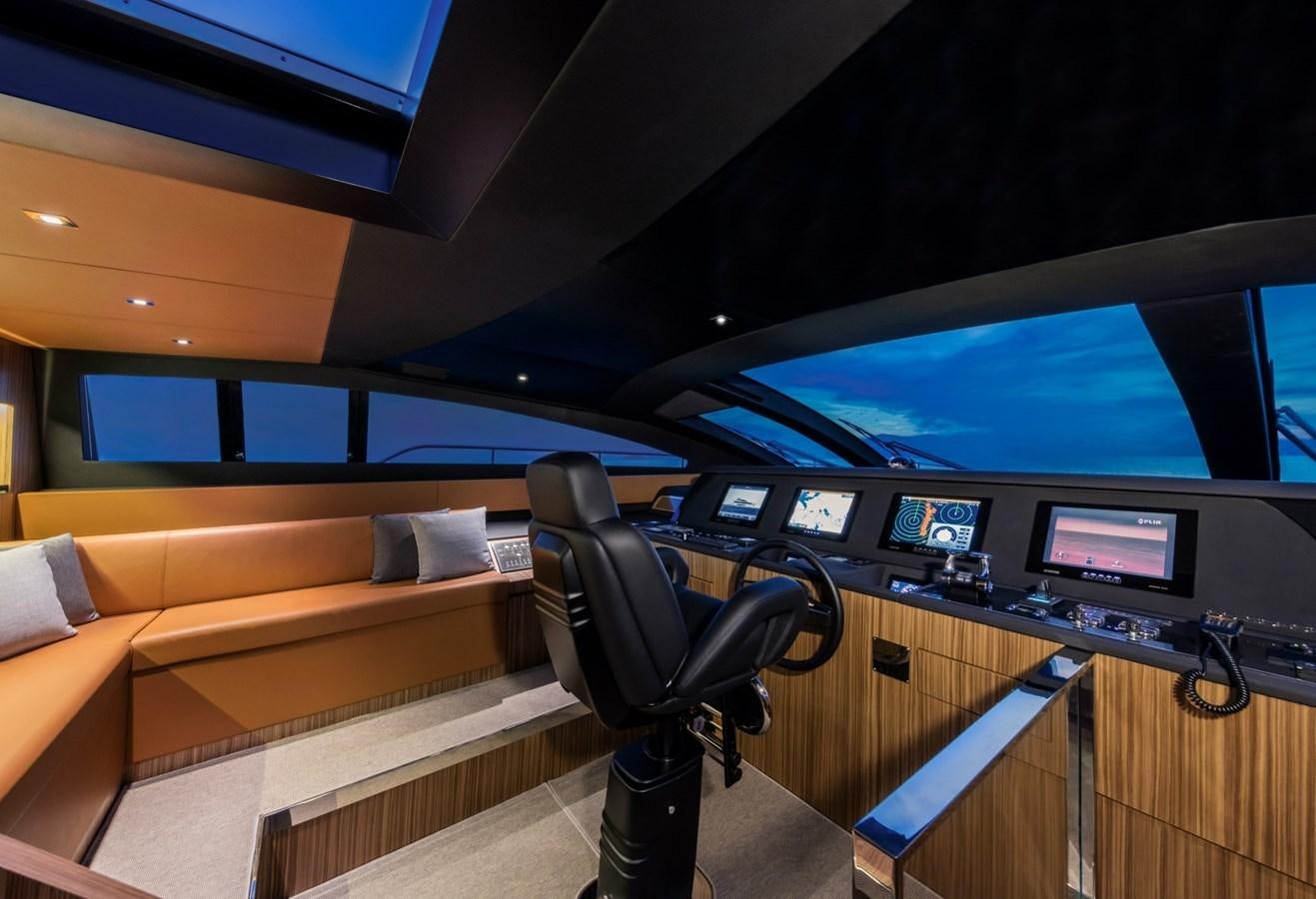 a room with a couch and a tv aboard BESO Yacht for Sale