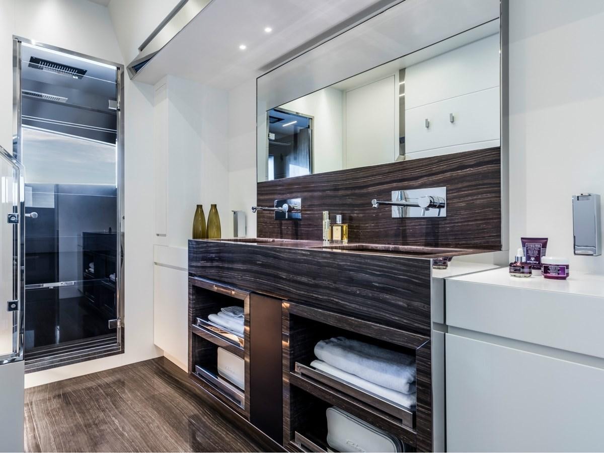 a kitchen with a glass door aboard BESO Yacht for Sale