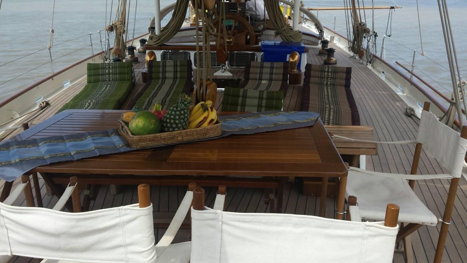 a boat with fruit on it aboard DALLINGHOO Yacht for Sale