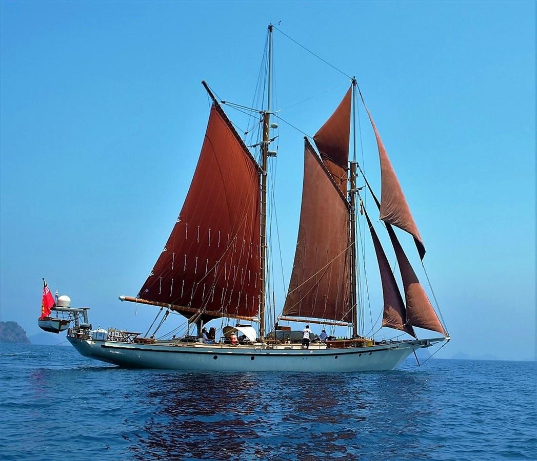 a sailboat on the water aboard DALLINGHOO Yacht for Sale