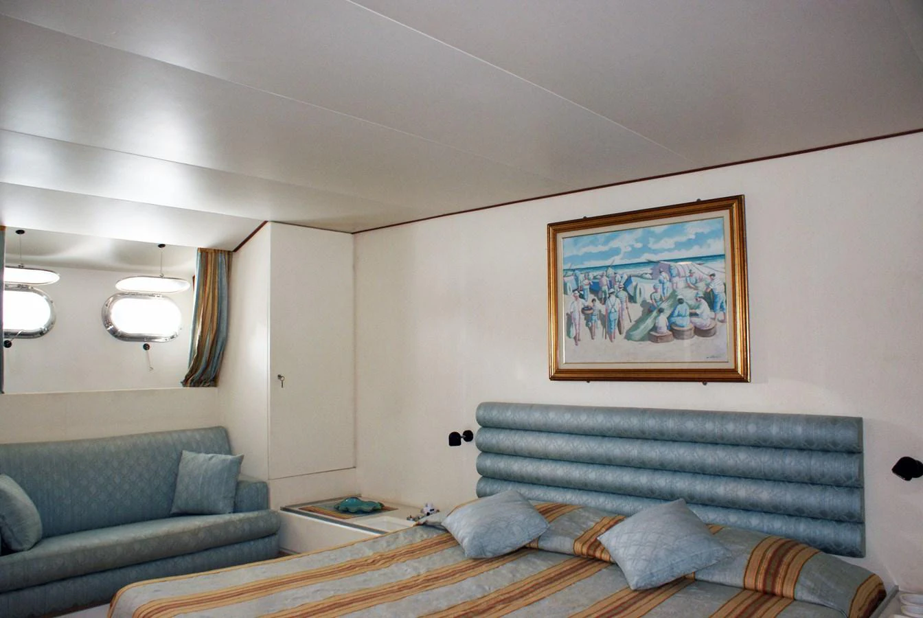 a bed in a room aboard LUC AN Yacht for Sale