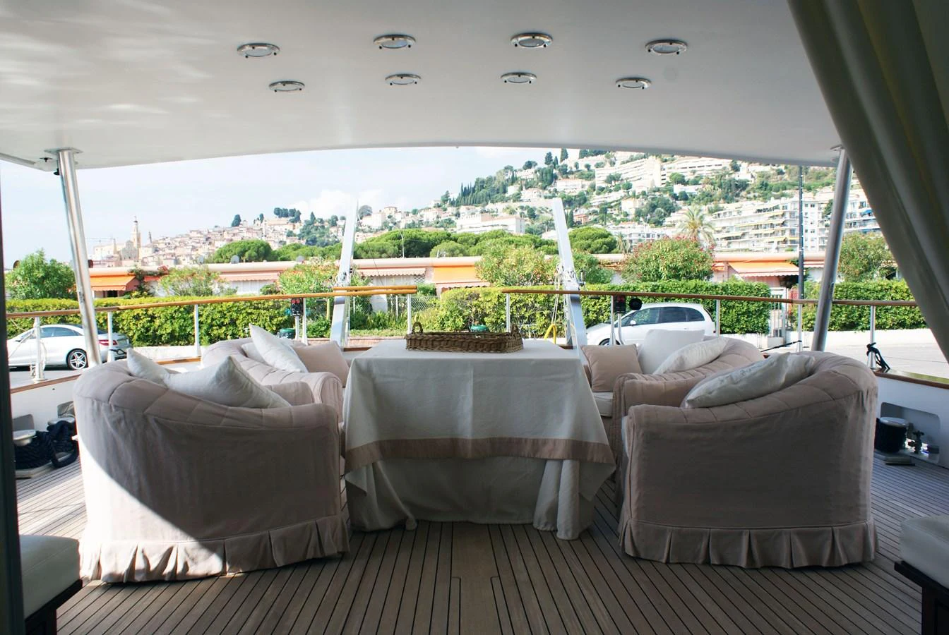 a room with couches and a view of a city aboard LUC AN Yacht for Sale