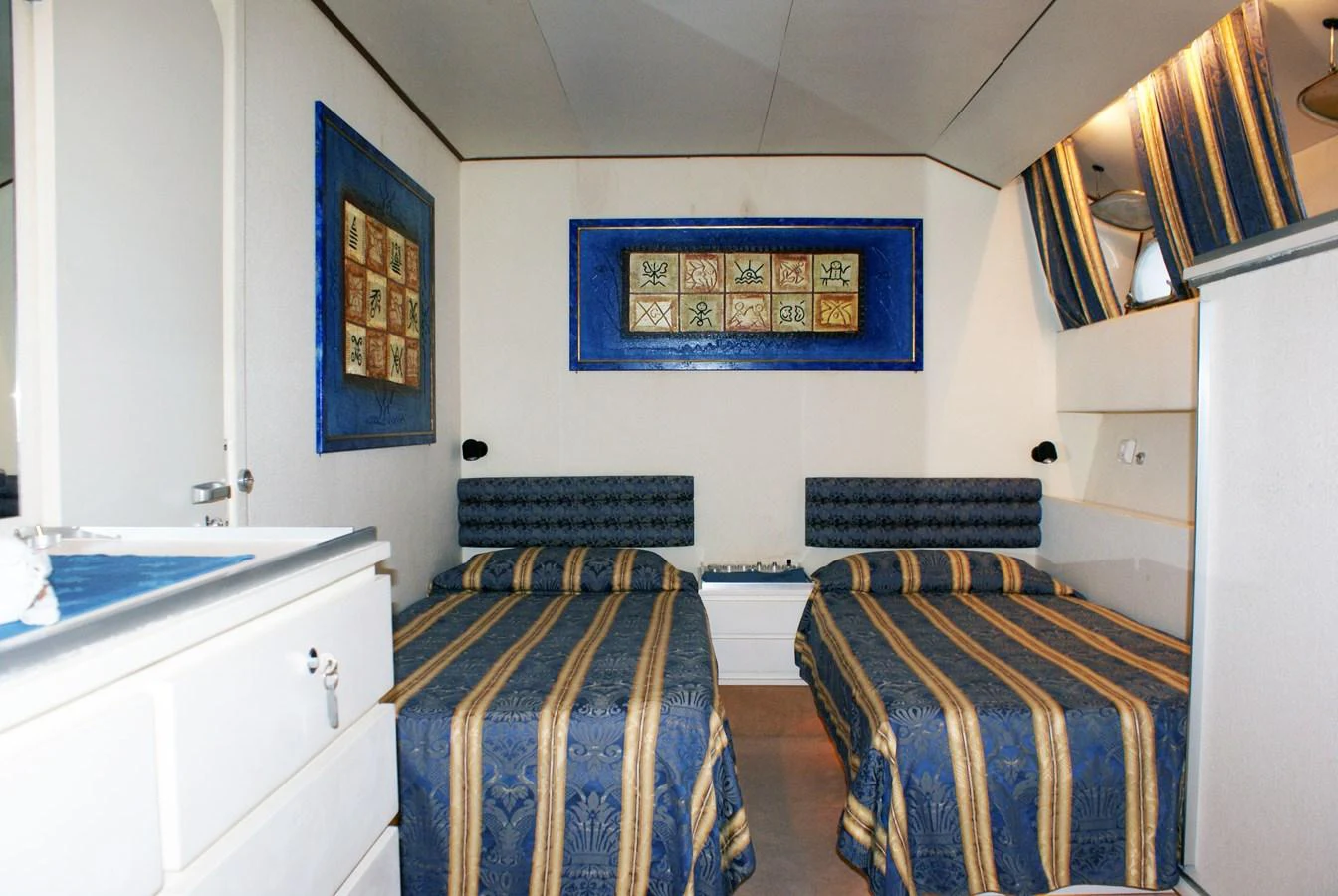 a couple of beds in a room aboard LUC AN Yacht for Sale