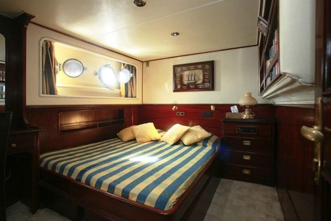 a bed in a room aboard MISS EVA Yacht for Sale