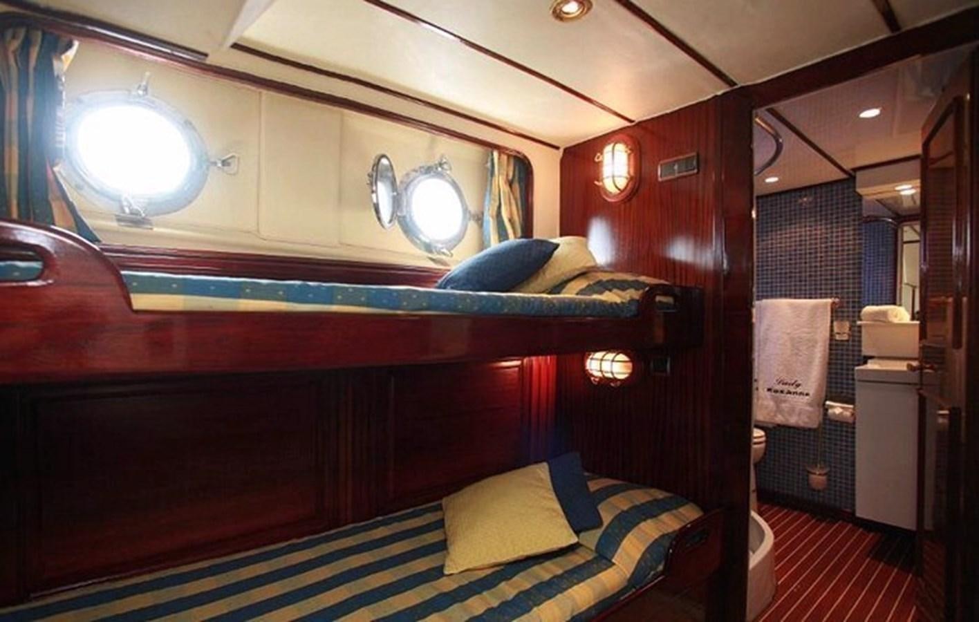 a bed in a room aboard MISS EVA Yacht for Sale