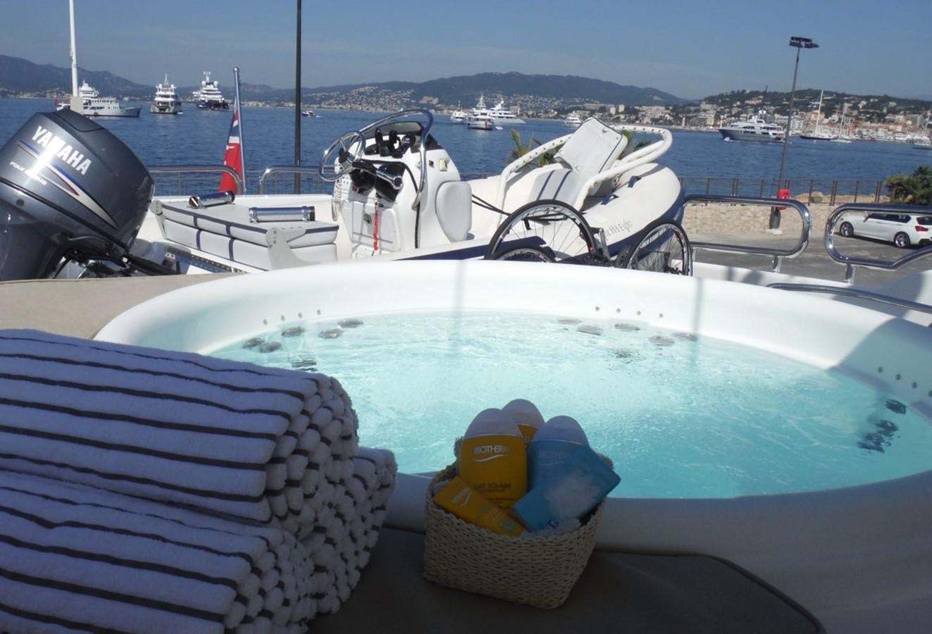 a boat with a yellow helmet on it aboard TRIPLE 888 EIGHT Yacht for Sale