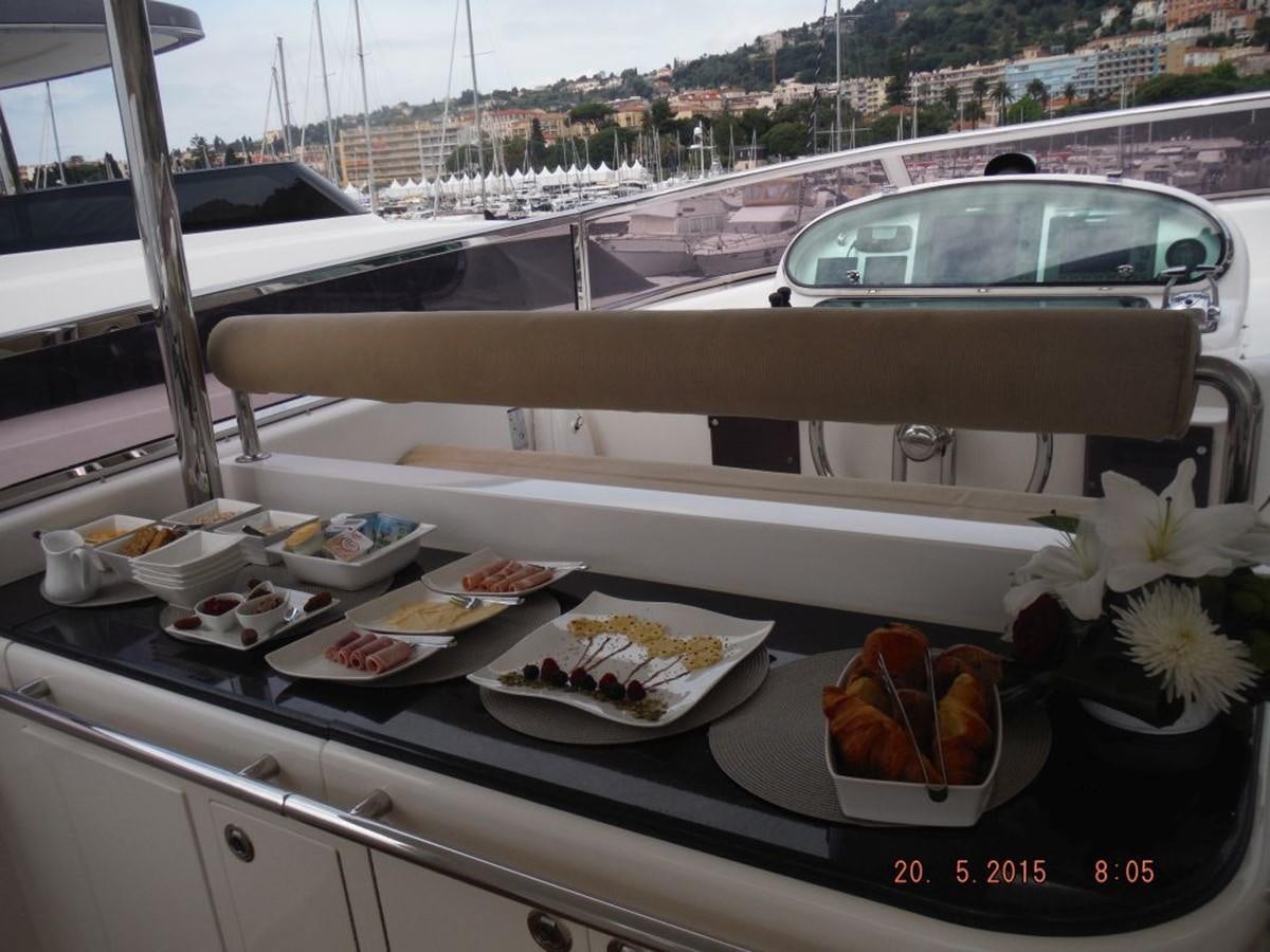 a tray of food on a boat aboard TRIPLE 888 EIGHT Yacht for Sale