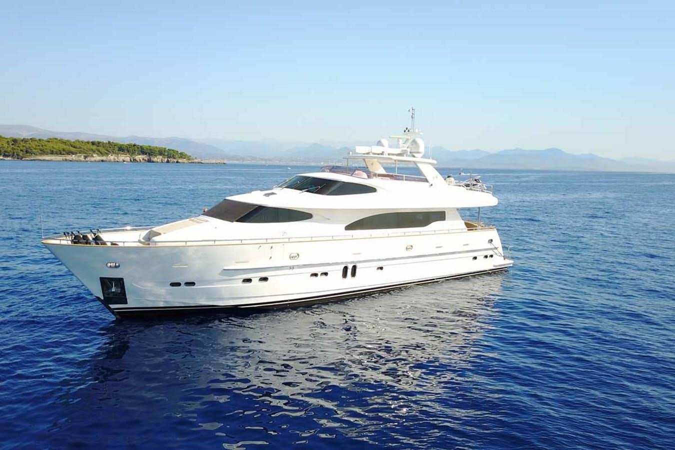 a white yacht on the water aboard TRIPLE 888 EIGHT Yacht for Sale