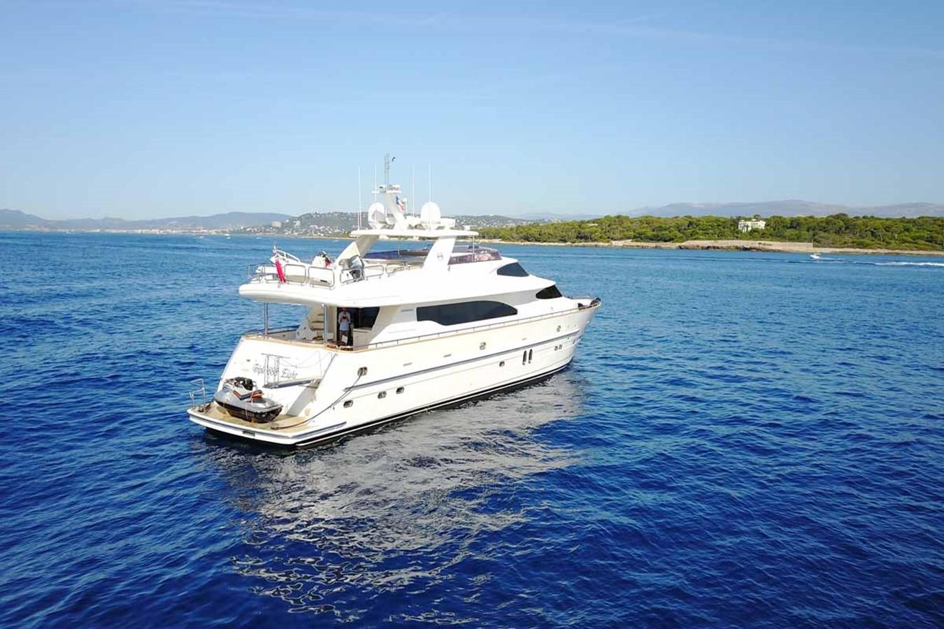 a white boat in the water aboard TRIPLE 888 EIGHT Yacht for Sale