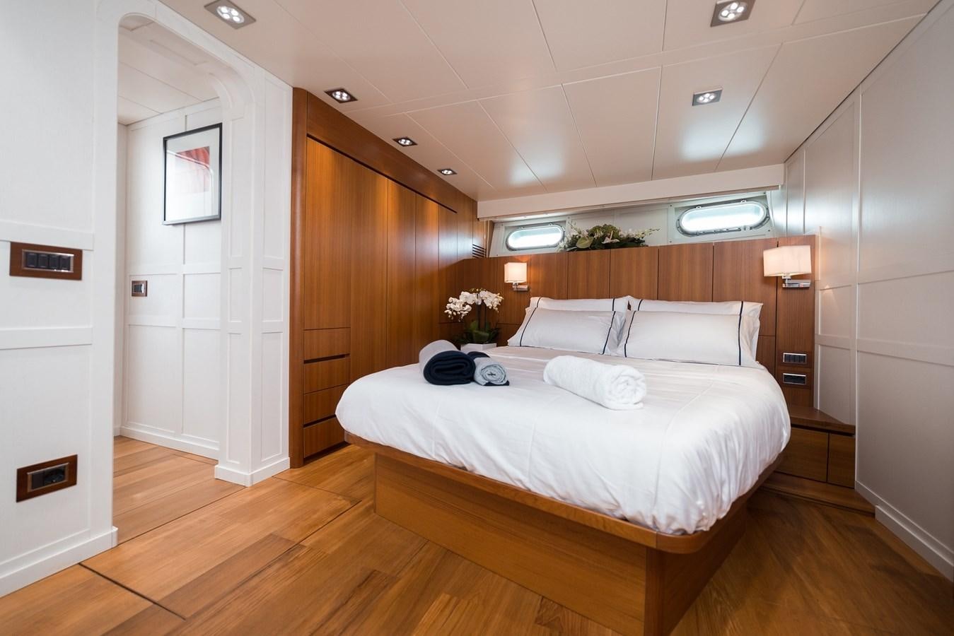 a bed in a room aboard PAOLUCCI Yacht for Sale