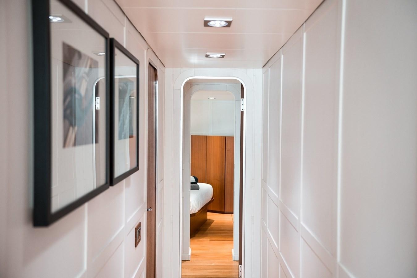 a bathroom with a black framed mirror aboard PAOLUCCI Yacht for Sale