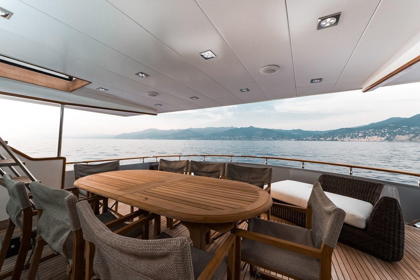 a table and chairs on a boat aboard PAOLUCCI Yacht for Sale
