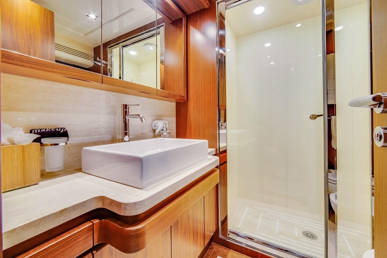 a bathroom with a sink and a shower aboard GERRY'S FERRY Yacht for Sale