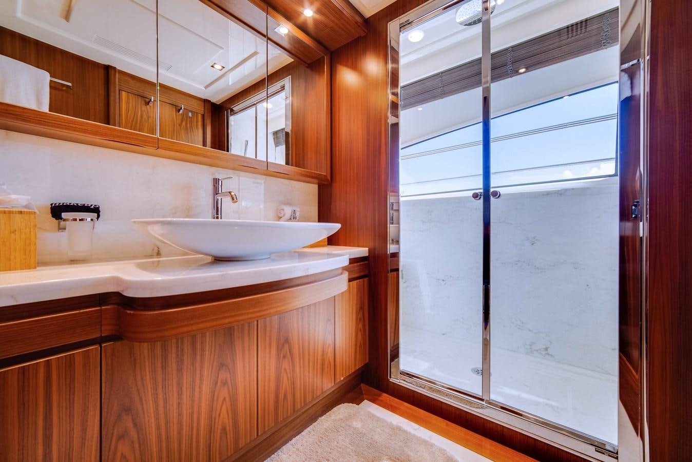 a bathroom with a sink and a shower aboard GERRY'S FERRY Yacht for Sale