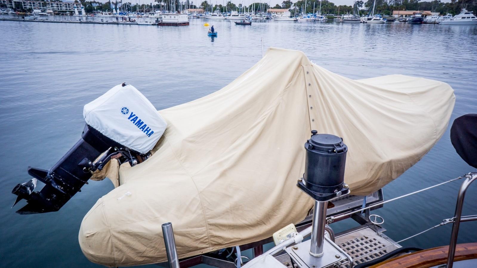 a boat with a cover on the front aboard ODYSSEUS Yacht for Sale