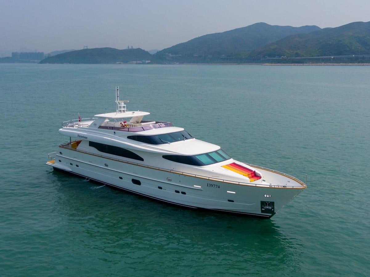 a white yacht in the water aboard VICTORIOUS Yacht for Charter