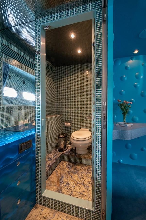 a bathroom with a glass shower aboard VICTORIOUS Yacht for Charter