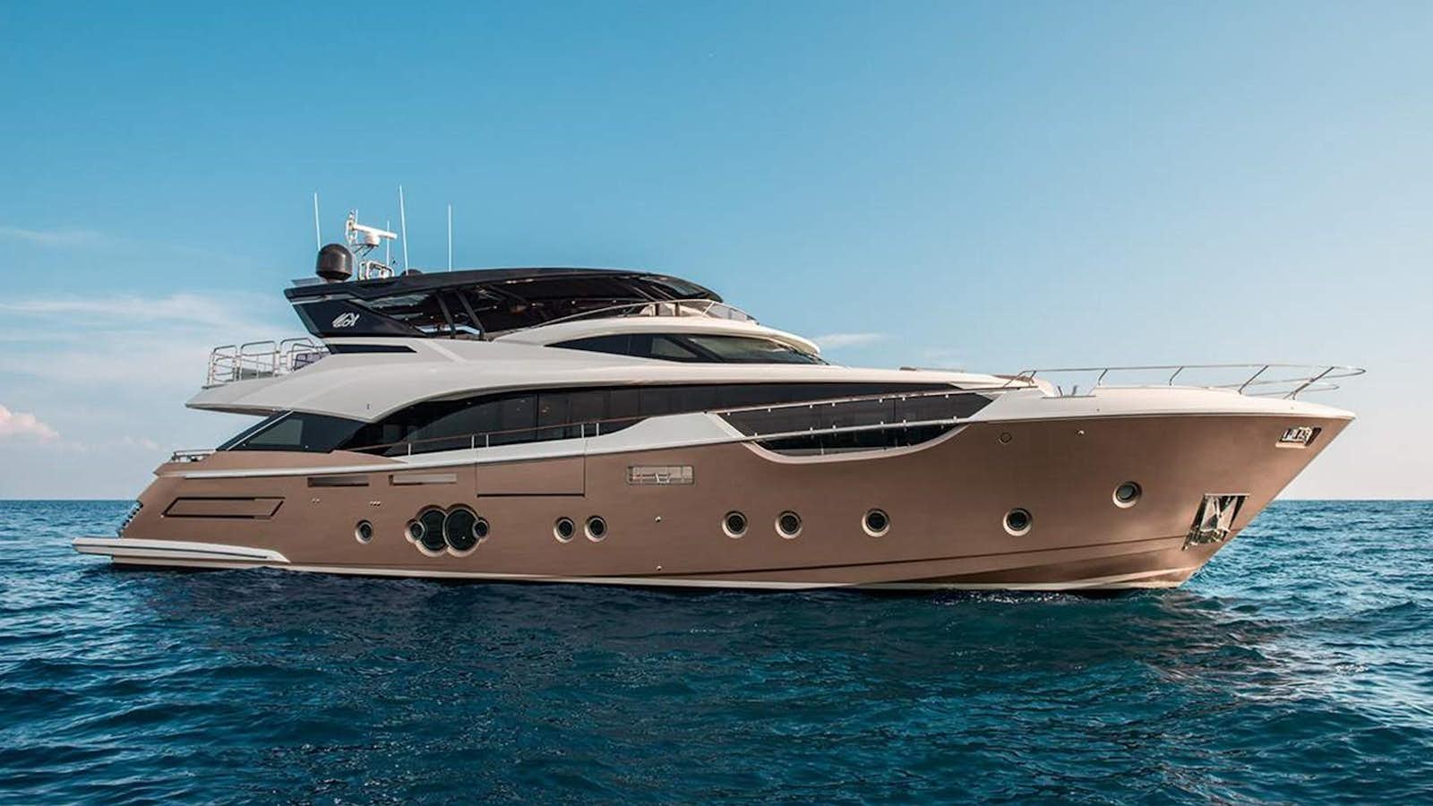 a large white yacht in the water aboard MONTE CARLO YACHTS MCY 96 Yacht for Sale