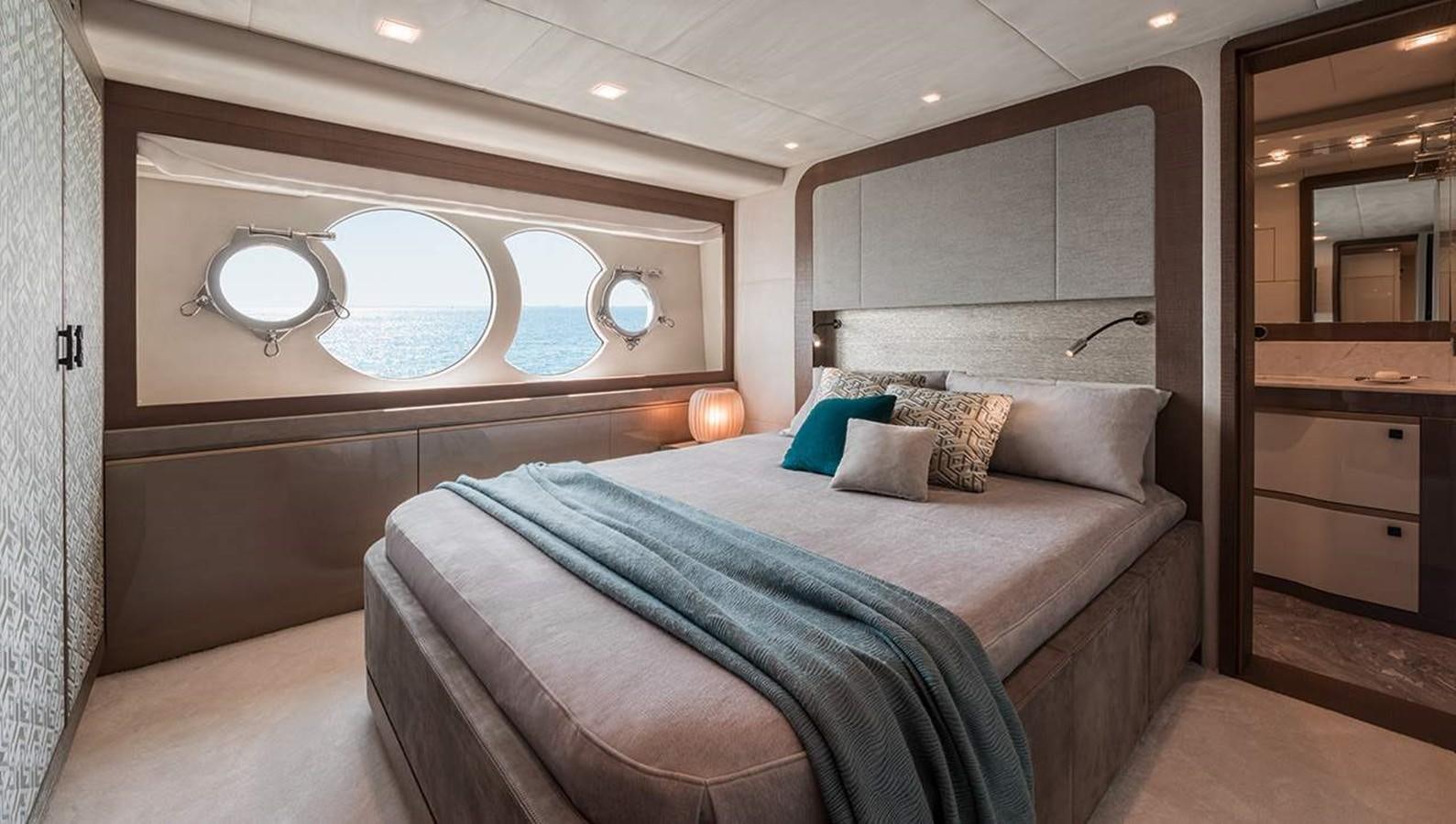 a bed in a room aboard MONTE CARLO YACHTS MCY 96 Yacht for Sale