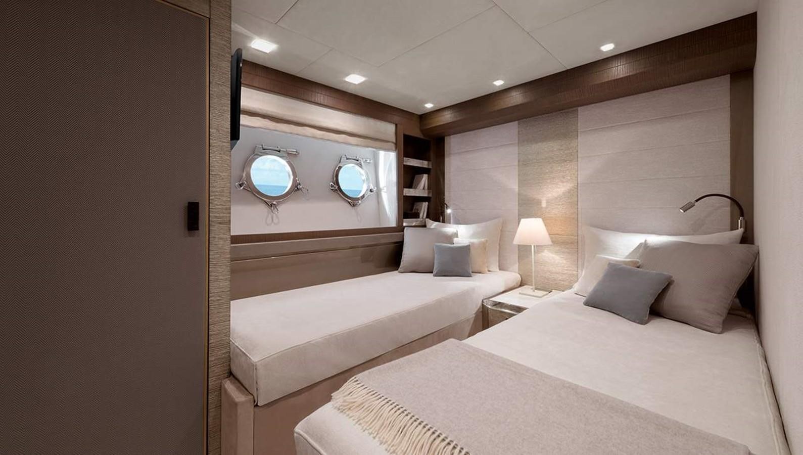 a room with two beds aboard MONTE CARLO YACHTS MCY 96 Yacht for Sale