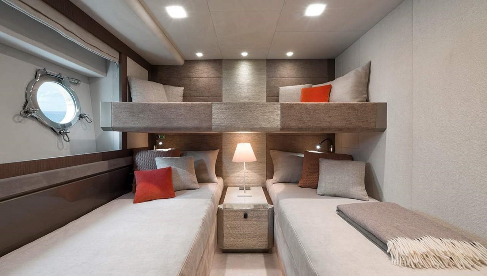 a room with a bed and a mirror aboard MONTE CARLO YACHTS MCY 96 Yacht for Sale