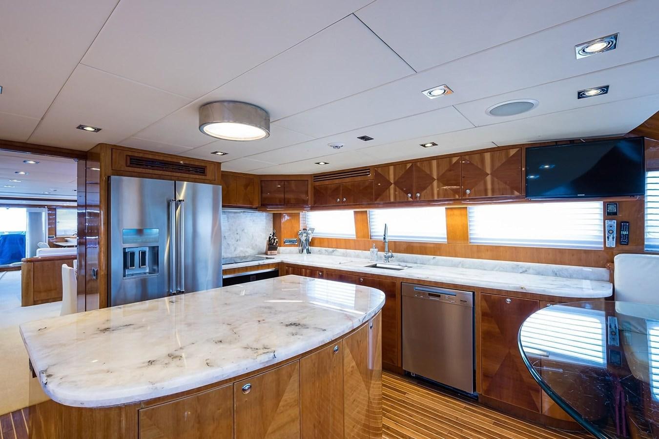 a kitchen with a large island aboard OSSUM DREAM Yacht for Sale