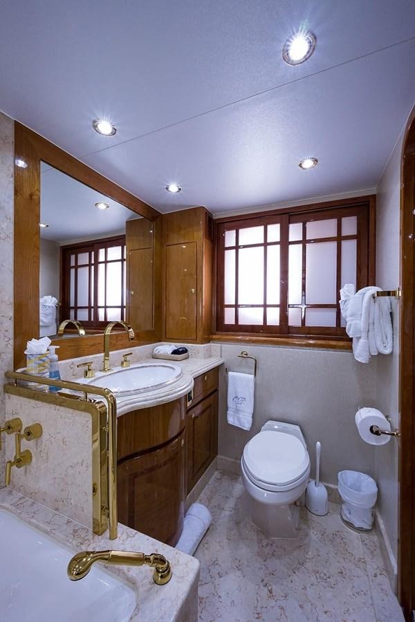 a bathroom with a sink toilet and a bathtub aboard OSSUM DREAM Yacht for Sale