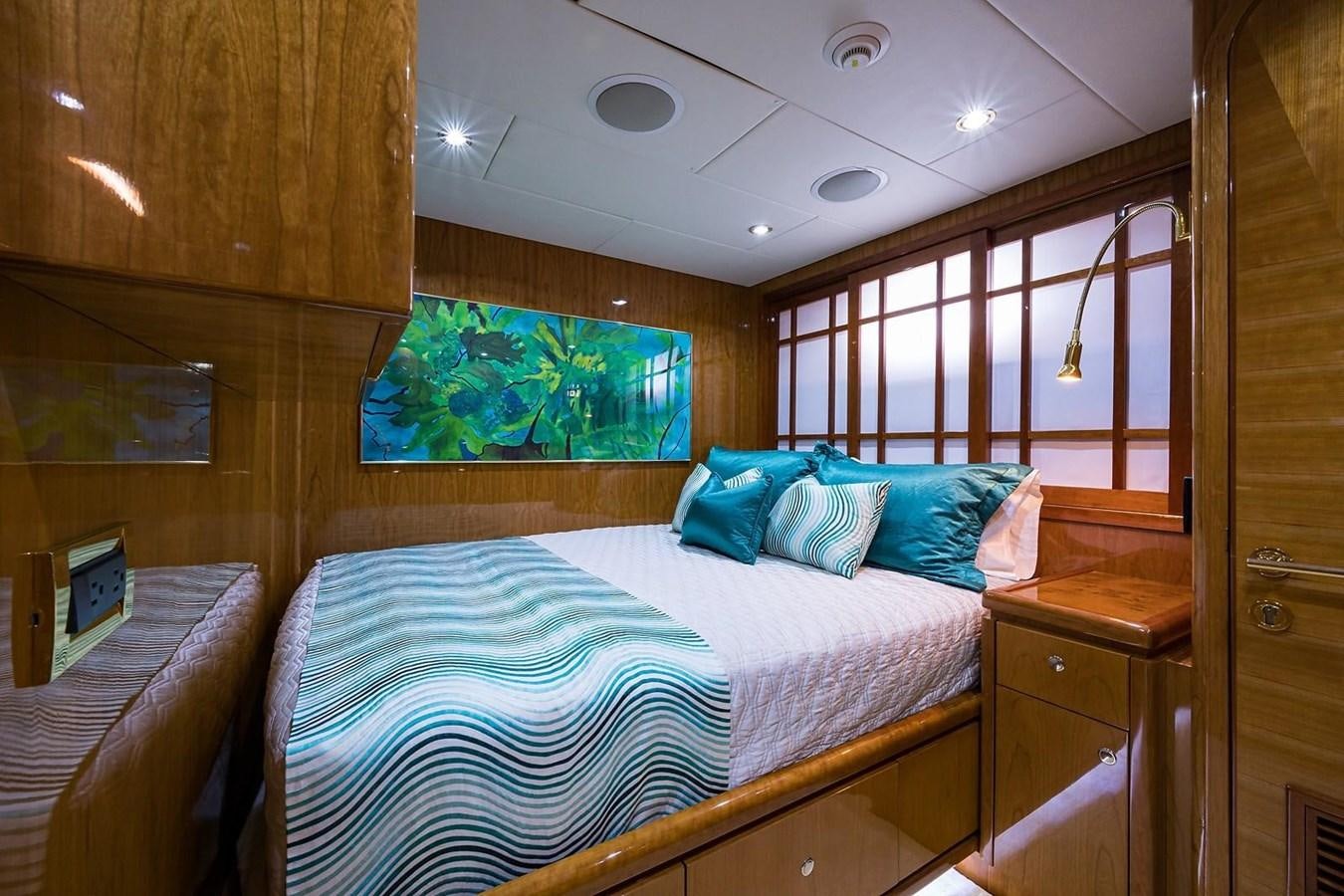 a room with a bed and a window aboard OSSUM DREAM Yacht for Sale