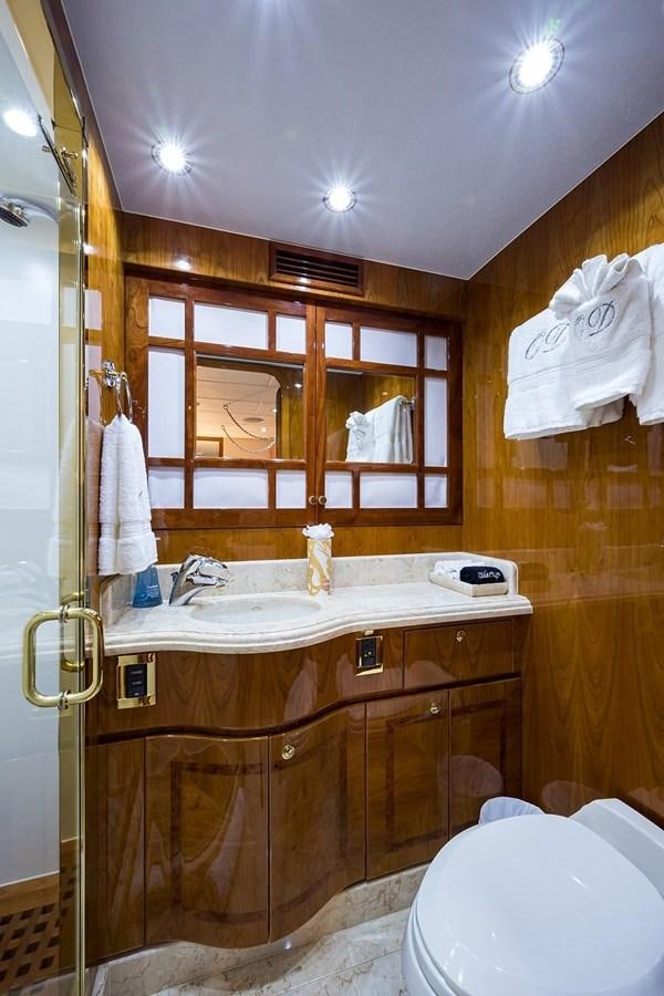 a bathroom with a sink and a toilet aboard OSSUM DREAM Yacht for Sale