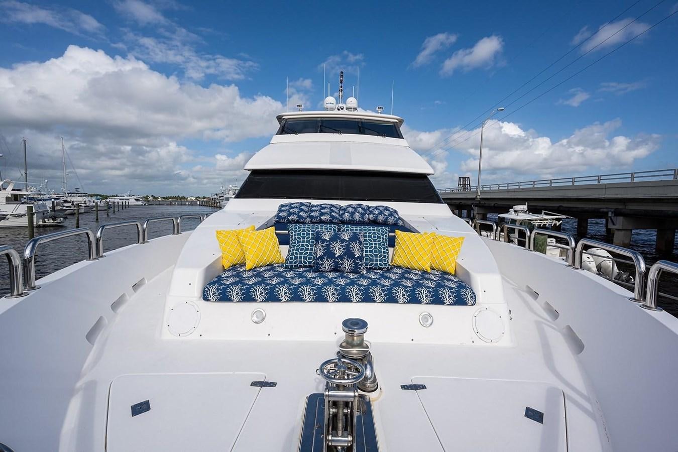 a white and blue boat aboard OSSUM DREAM Yacht for Sale