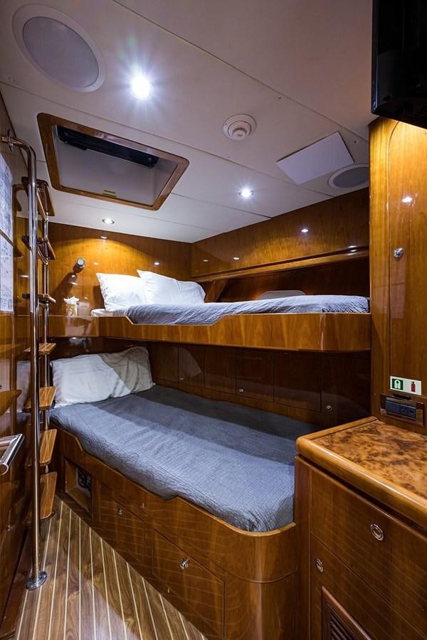 a room with bunk beds aboard OSSUM DREAM Yacht for Sale