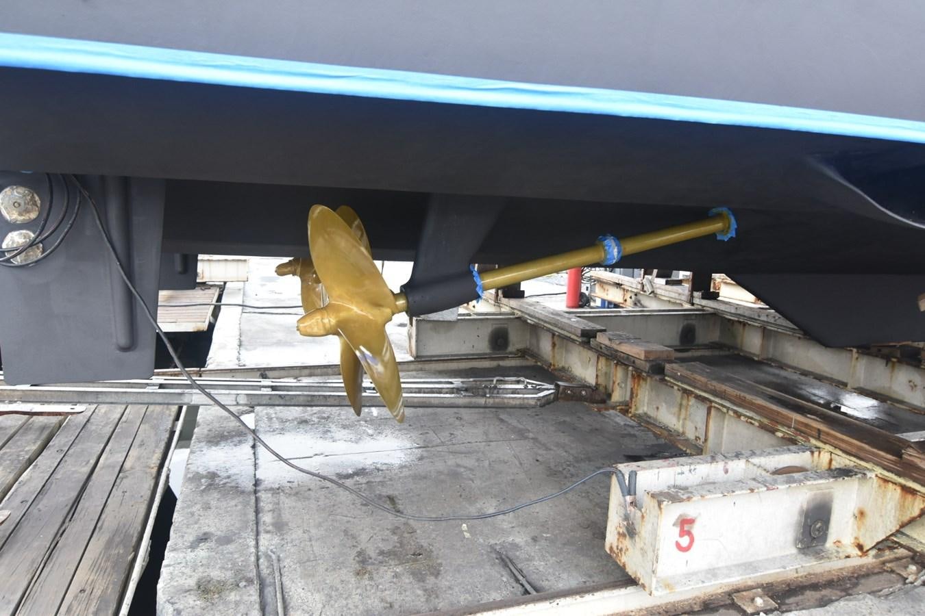 a toy dinosaur in a room aboard OSSUM DREAM Yacht for Sale