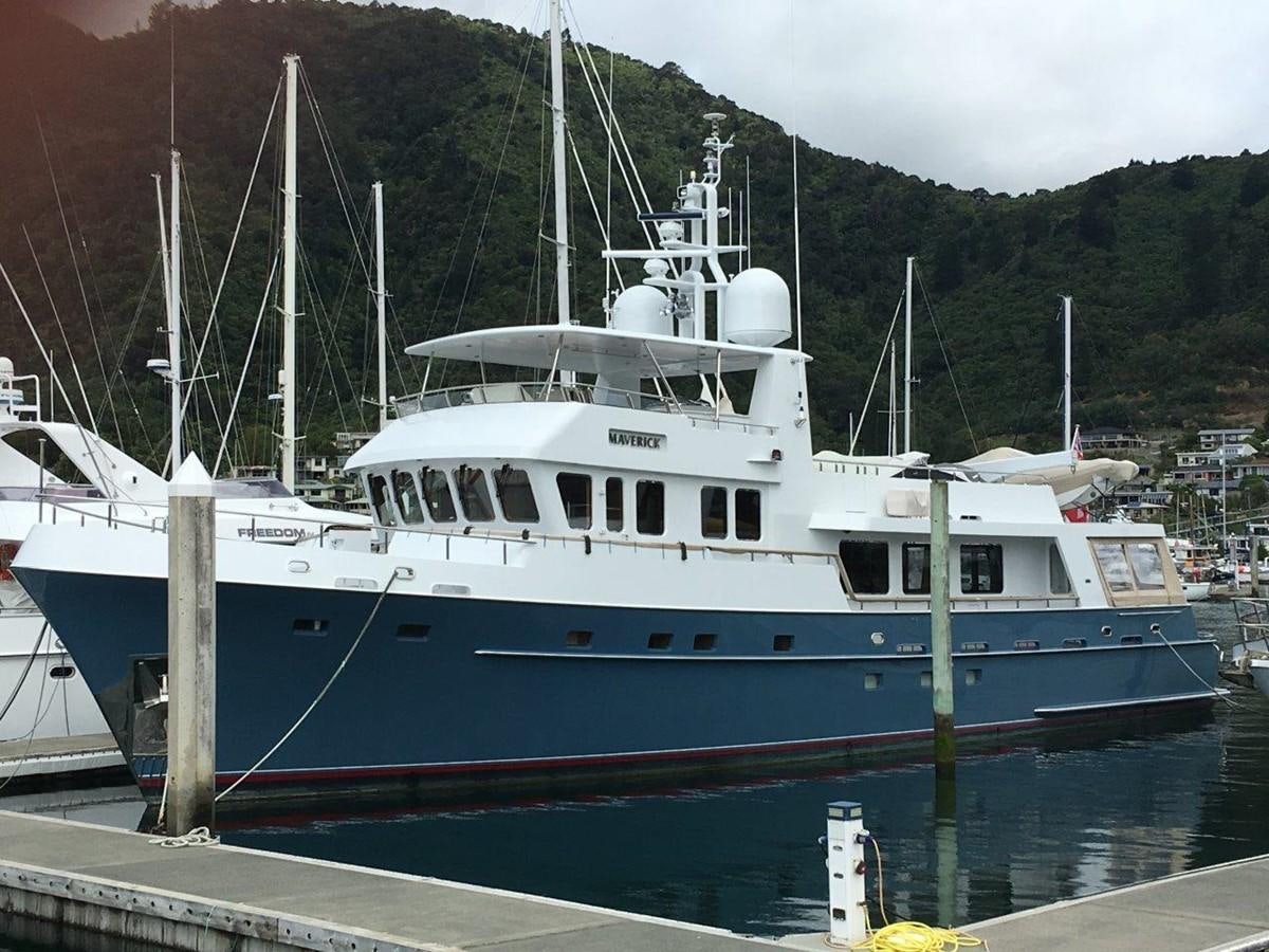 a boat docked at a pier aboard MAVERICK Yacht for Sale