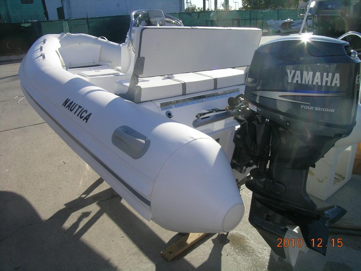 a white and black machine aboard MAVERICK Yacht for Sale