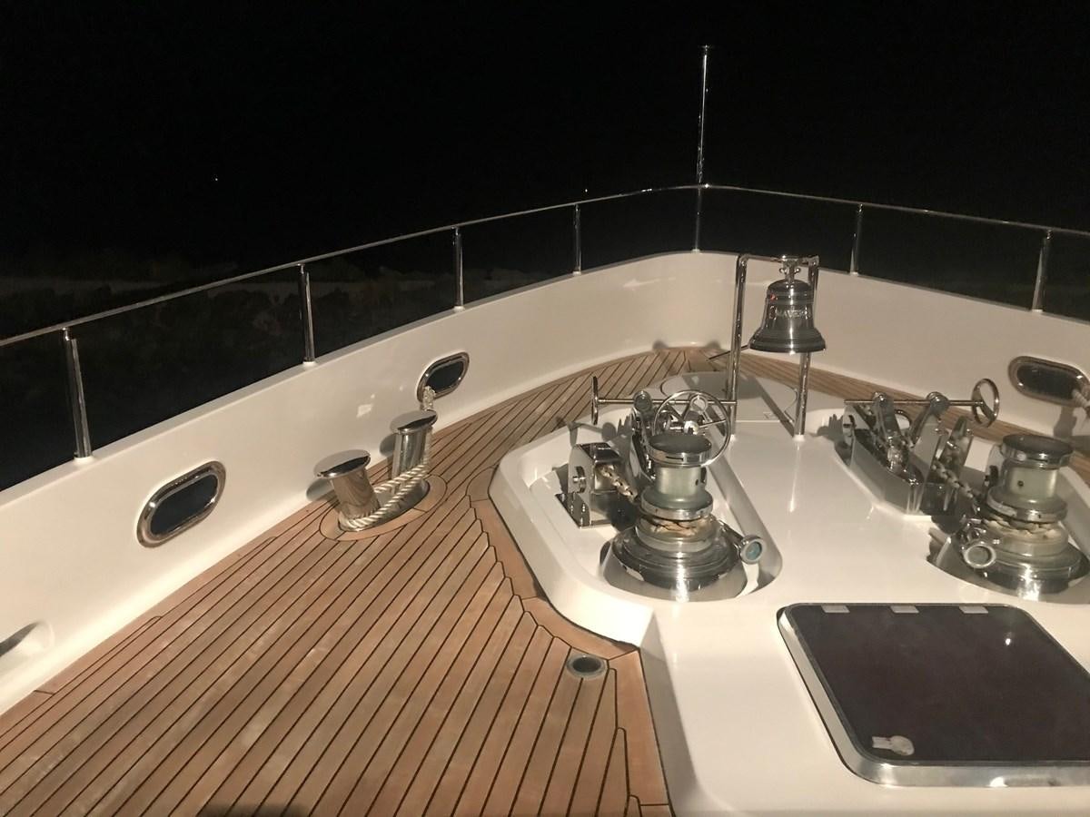 a kitchen with a sink and a cell phone aboard MAVERICK Yacht for Sale