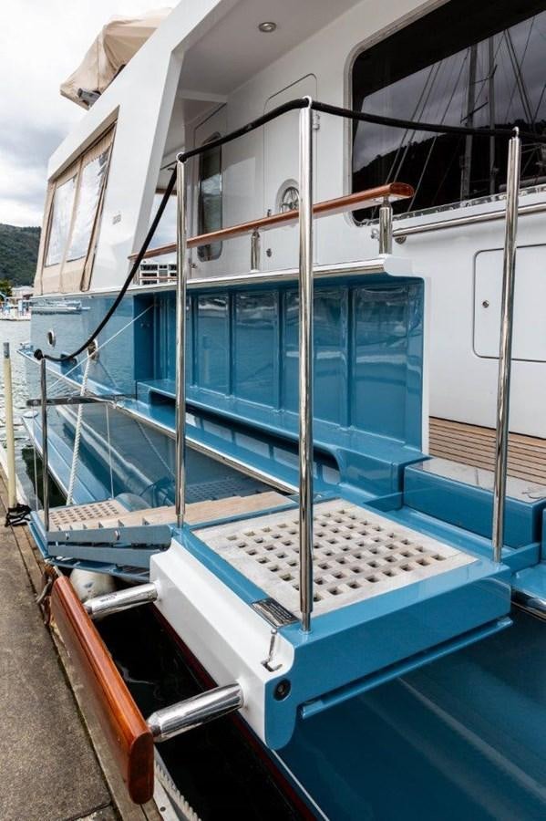 a blue and white boat aboard MAVERICK Yacht for Sale