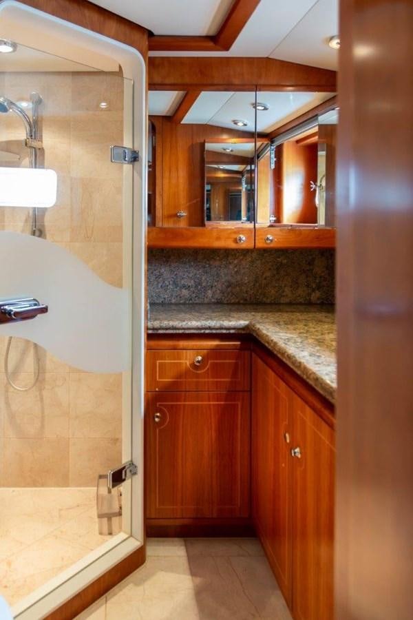 a bathroom with a marble counter top aboard MAVERICK Yacht for Sale