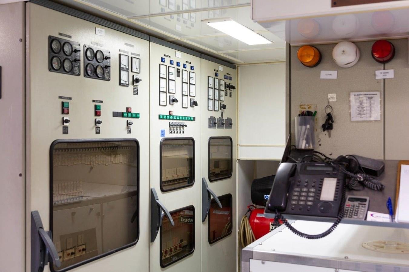 a control room with a few machines aboard MAVERICK Yacht for Sale