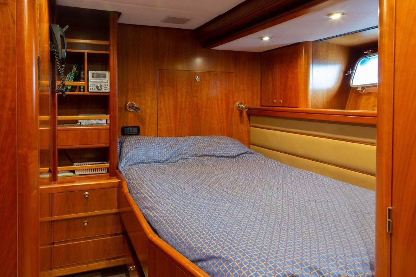 a bed in a room aboard MAVERICK Yacht for Sale