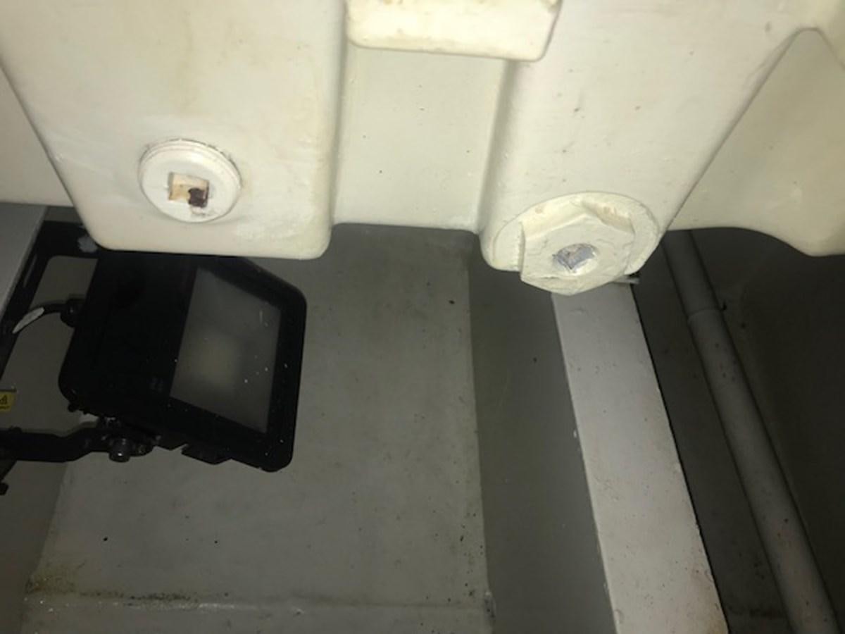 a black object on a white surface aboard MAVERICK Yacht for Sale