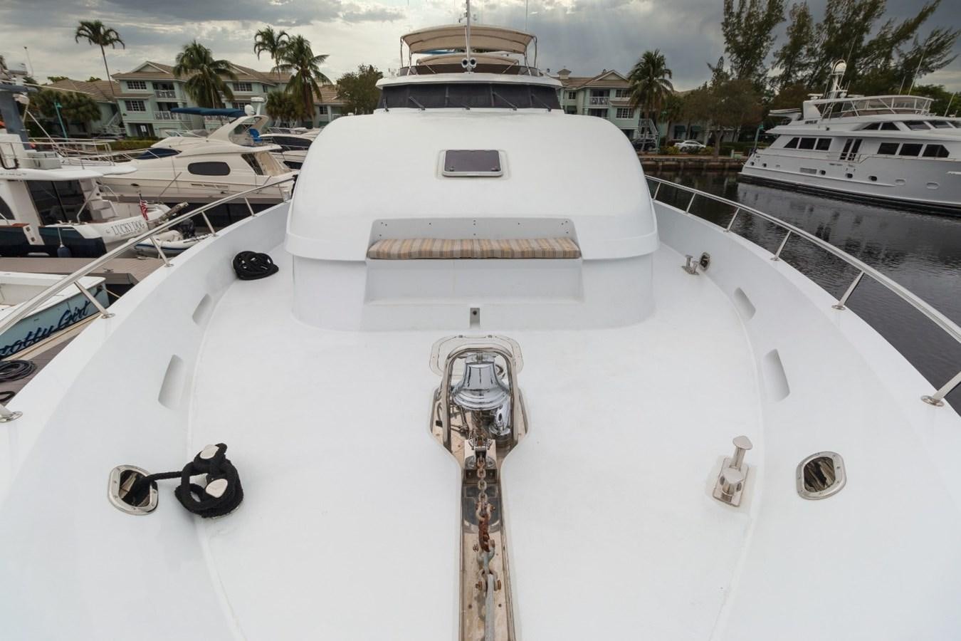 a white boat with a sword on it aboard CARPE DIEM Yacht for Sale