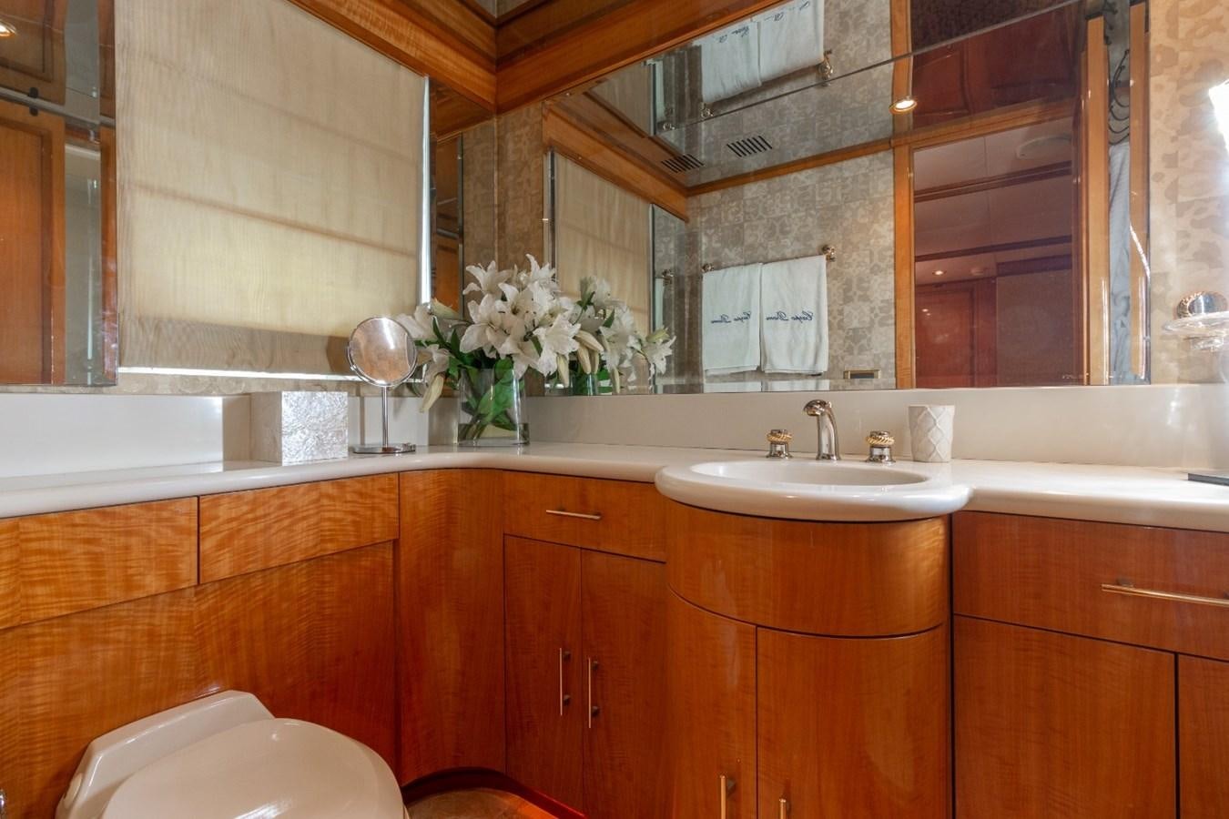 a bathroom with a sink and a bathtub aboard CARPE DIEM Yacht for Sale