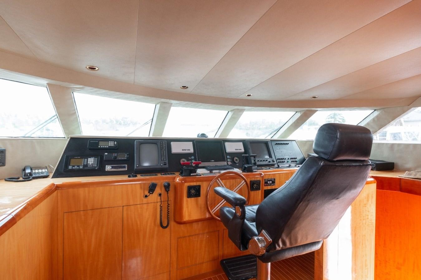 a chair in a room aboard CARPE DIEM Yacht for Sale