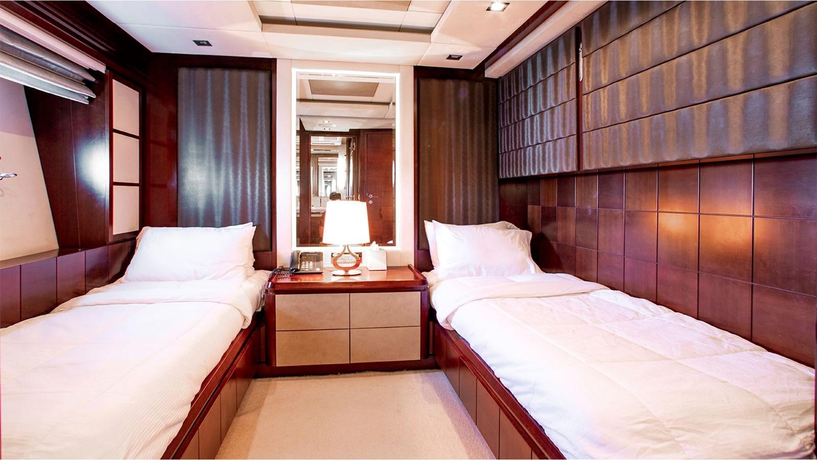 a room with two beds aboard BT 2 Yacht for Sale