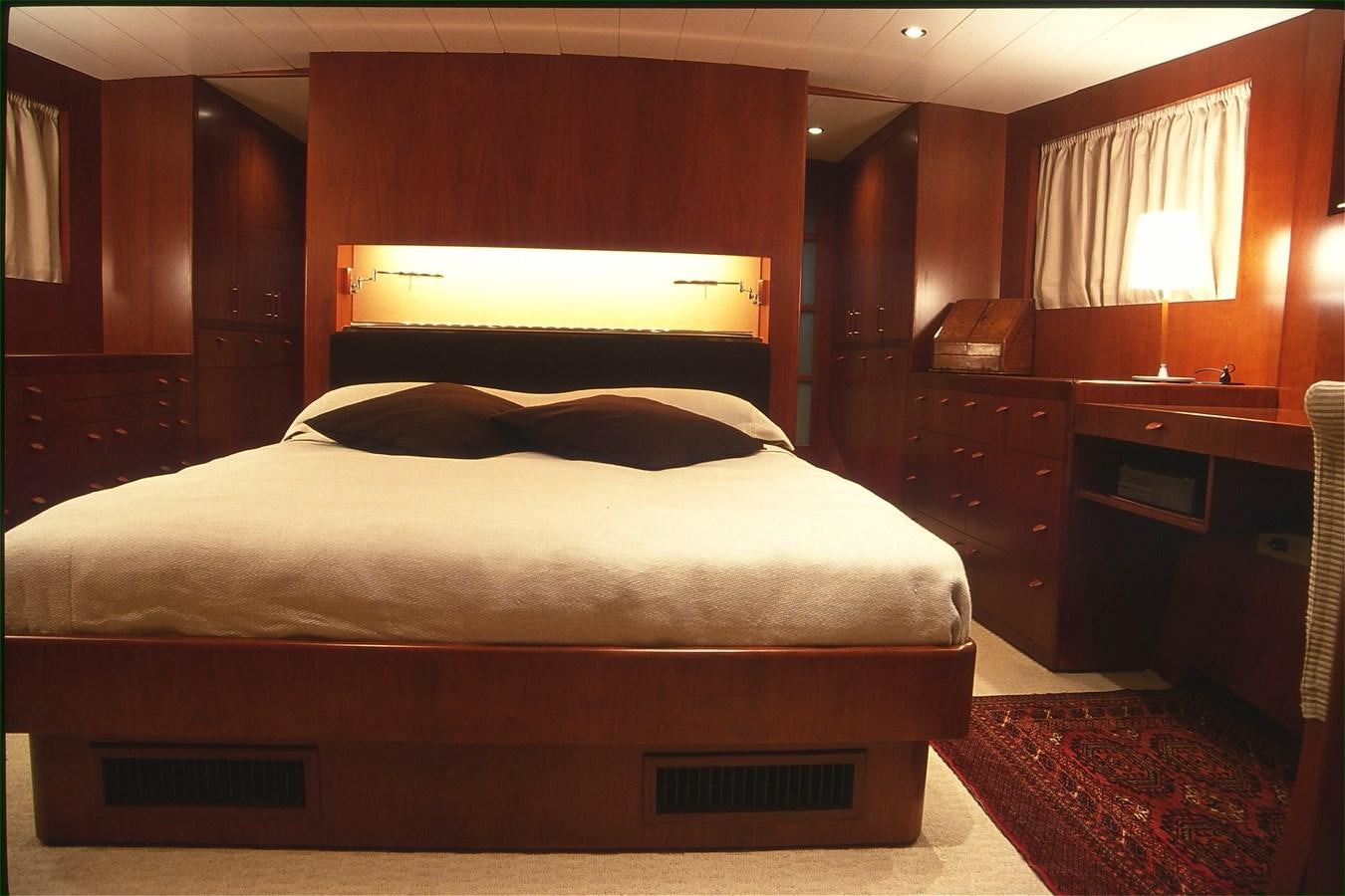 a bed in a room aboard FREE AT LAST Yacht for Sale