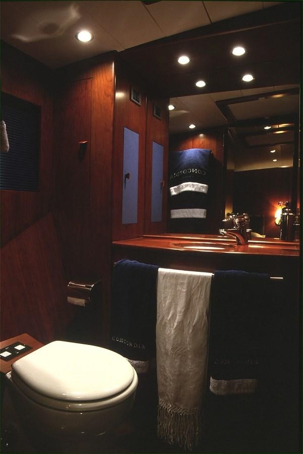 a bathroom with a sink and toilet aboard FREE AT LAST Yacht for Sale