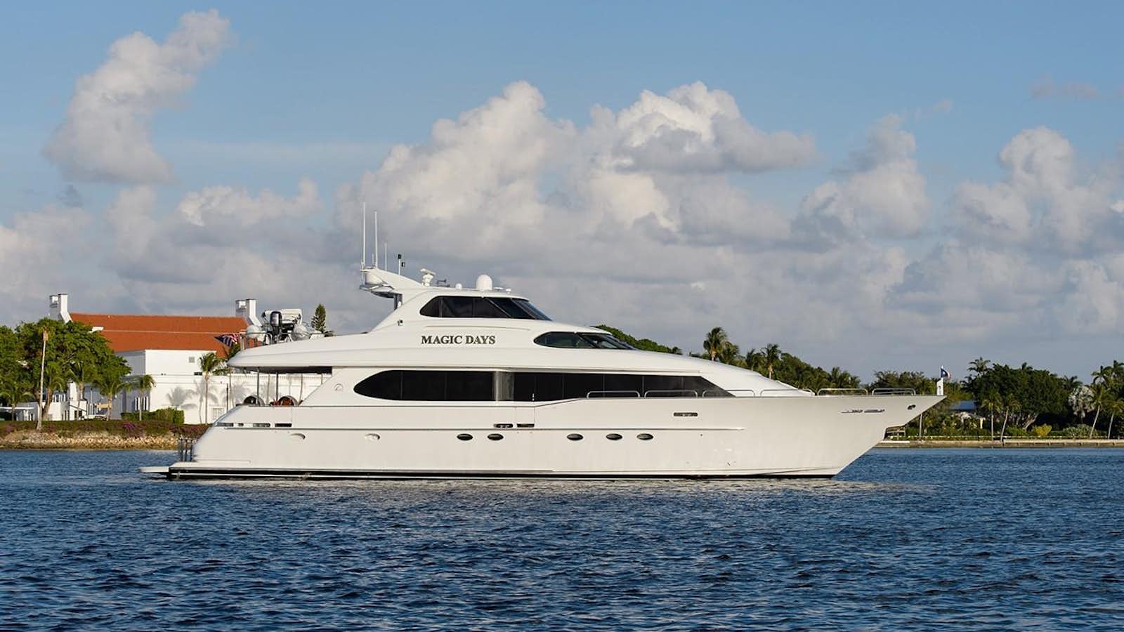 a white yacht on the water aboard MAGIC DAYS Yacht for Sale