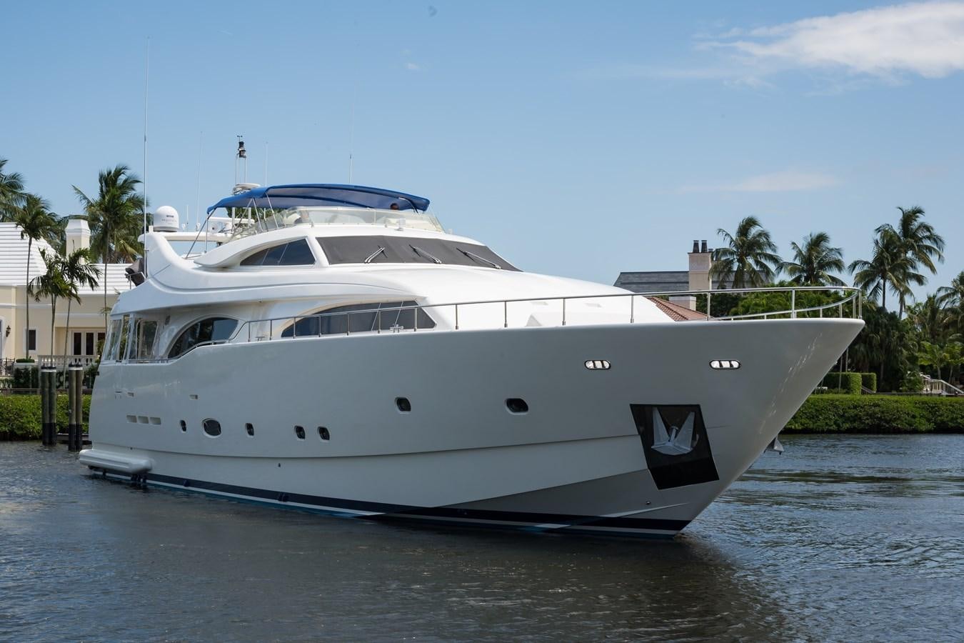 a white yacht on the water aboard TOMORROW WE RIDE Yacht for Sale